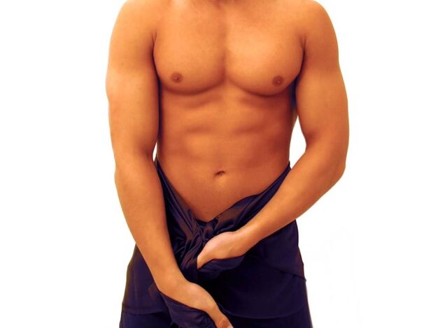 Un uomo esegue esercizi per ingrandire il suo pene